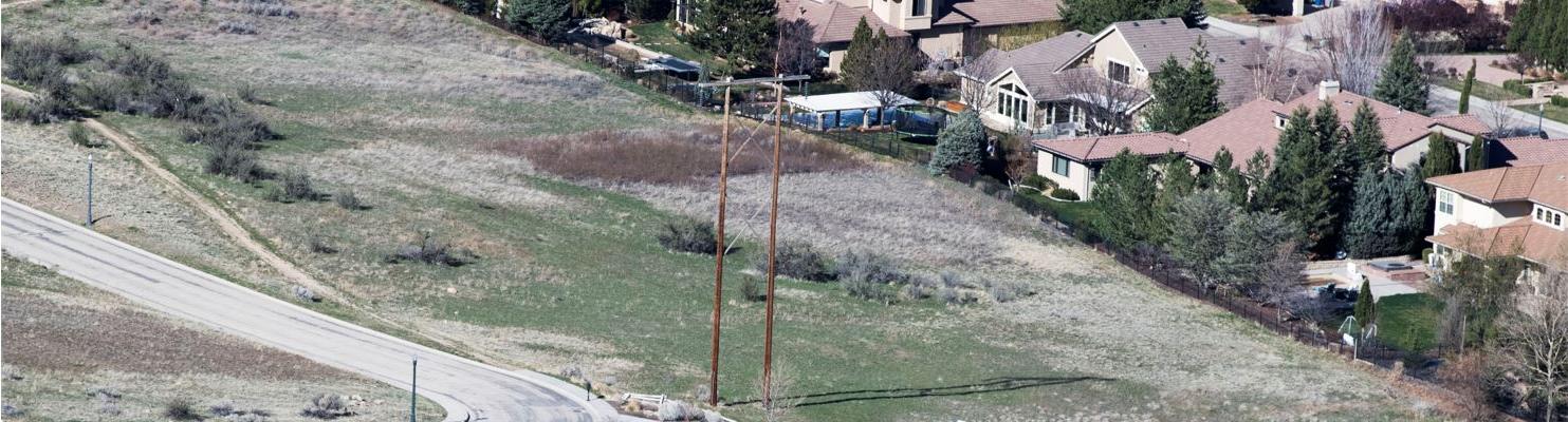 A 138-kV transmission line running through a large-lot subdivision in the Boise foothills.